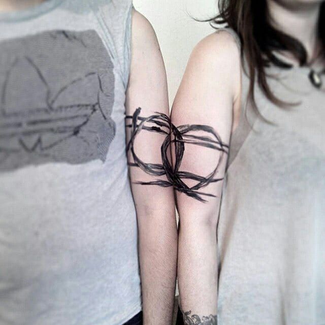 Matching couple tattoo by Marco Teixeira #coupletattoo #marcoteixeira #matching #bruchstroke