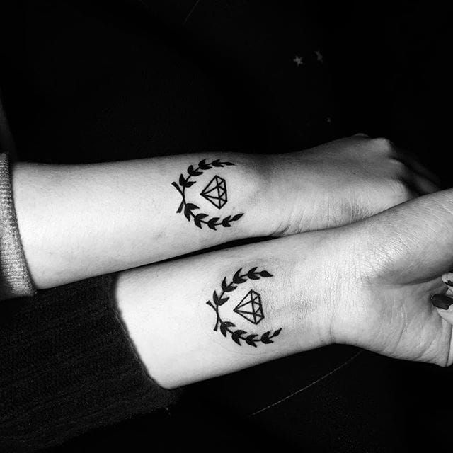 Diamonds are forever, tattoos are for life. @nutstattoo/Instagram #coupletattoo #diamonds #matching