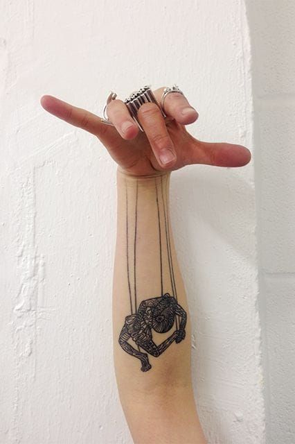 Fun placement for puppet master tattoos! Cool piece by Max Labar.