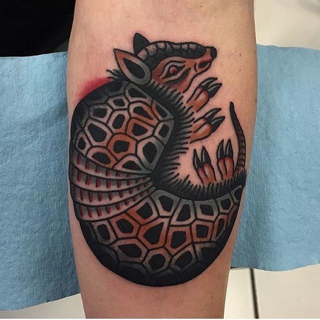 Armadillo hand tattoo by Scotty Munster TattooNOW