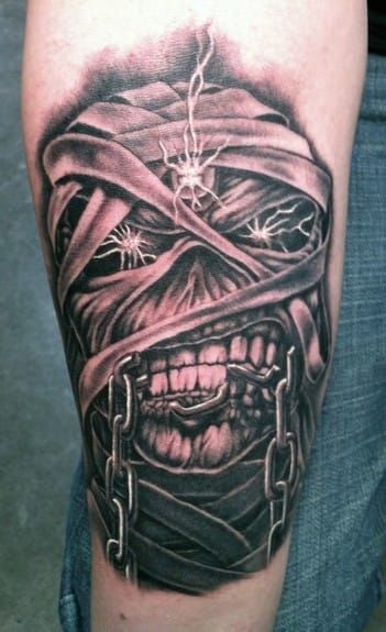 Mummified Eddie from the "Powerslave" era in 1984 tattoo by Bob Tyrell