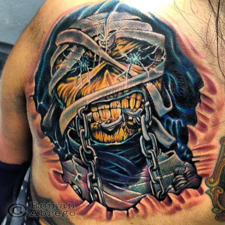 Stunning detail on the Powerslave tattoo by Roman Abrego