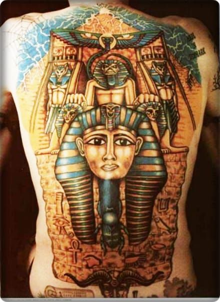 Or you could just go the whole hog and get the entire Powerslave album cover done! 100% true Iron Maiden fan!
