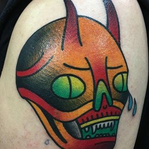 Vibrant devil tattoo by #IsaiahToothtaher. Photo from @toothtaker