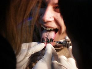 Getting a tongue tattoo