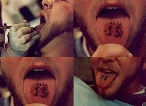 number 13 tongue tattoo