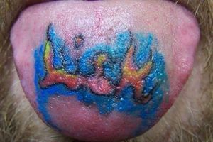 Colorful lick tattoo, lettering tongue tattoo