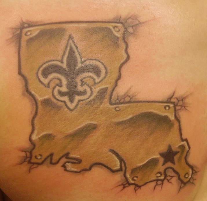 In this Jan 27 2010 photo barber Willie Pearson displays his New Orleans  Saints tattoo in Impressive Barber Shop in New Orleans A lifelong Saints  fan he got the tattoo after the