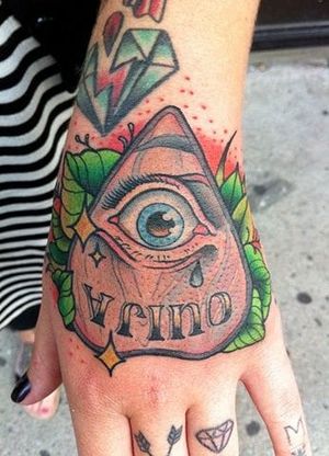 This all-seeing planchette is by Mike Moses.