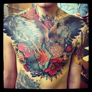 Amazing chest piece done by Alix Ge Tattoo.