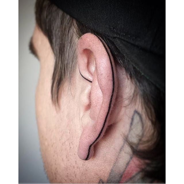 Tattoo uploaded by Xavier • Hand poke ear tattoo by Indy Voet. #IndyVoet  #handpoke #lines #subtle #ear #eartattoo #blackwork #linework • Tattoodo