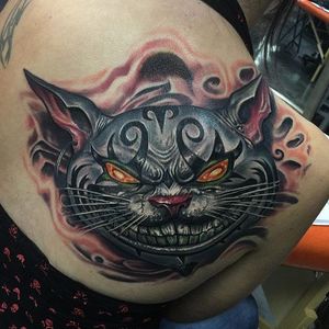 Cheshire cat tattoo by Roman Abrego. #cheshirecat #aliceinwonderland
