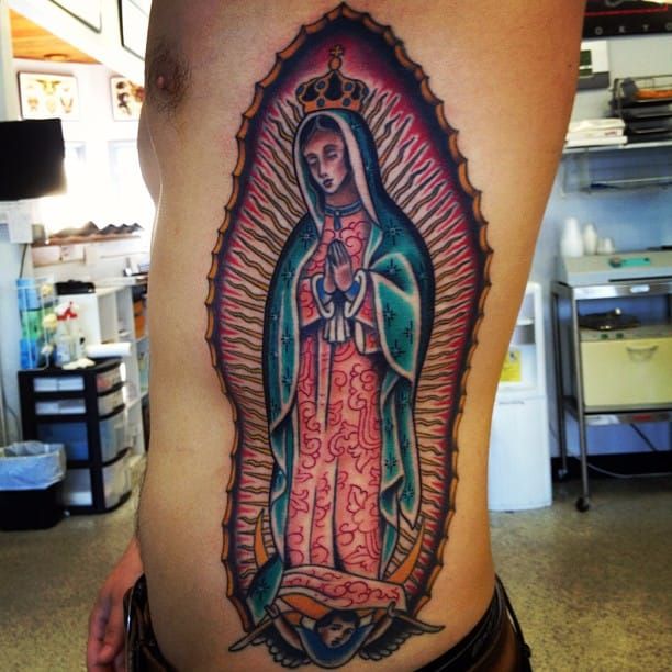 Wearing her faith on her sleeve honoring Our Lady of Guadalupe outside the  church