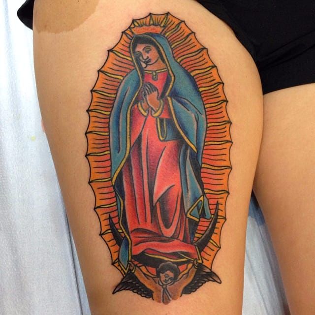 Wearing her faith on her sleeve honoring Our Lady of Guadalupe outside the  church