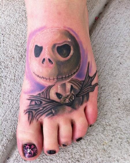 Delicate foot tattoo..