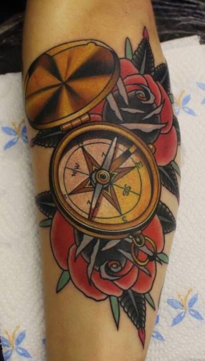traditional compass hand tattoos