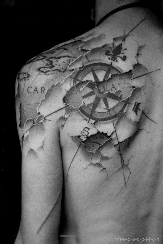A compass tattoo on top of a map is a common tattoo design layout. One might opt for the traditional layout... or something different. Unknown artist #compass #map #direction