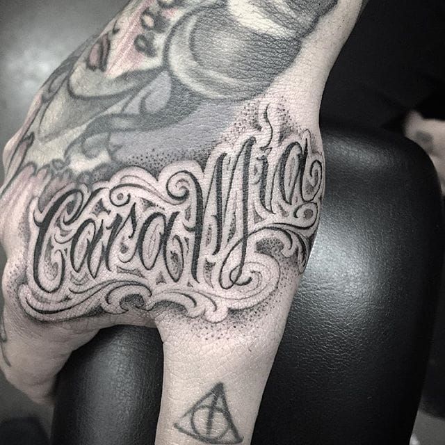 Lettering Hand Tattoo by Three Kings Tattoo