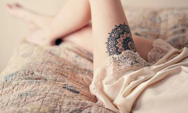 front thigh quote tattoos