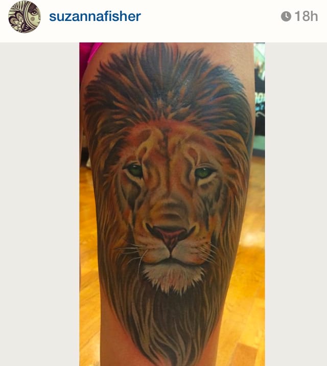 Space is a big reason for a thigh tattoo, there's plenty to work with. Color realism in a front thigh piece by artist Suzanne Fisher. #suzannefisher #thigh #realism #lion