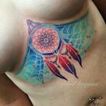 Dreamcatcher tattoo by David Boggins. #dreamcatcher #popular #trend #underboob #color #nativeamerican