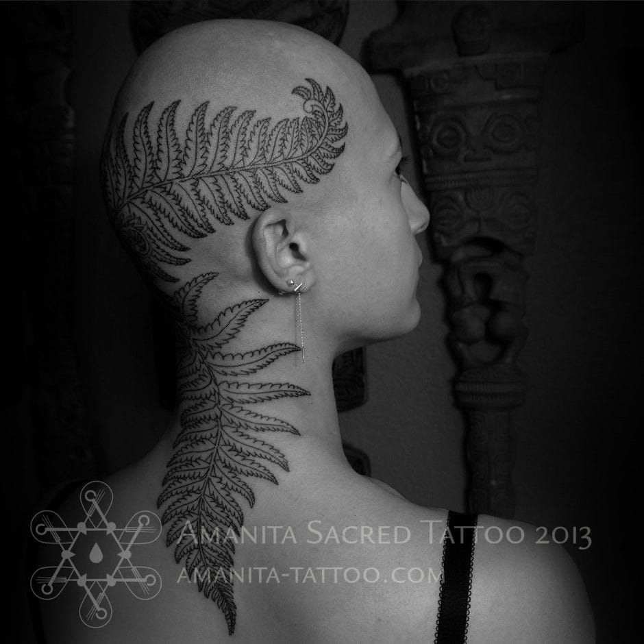 Impressive and gorgeous work by Mike Amanita on this huge fern tattoo.