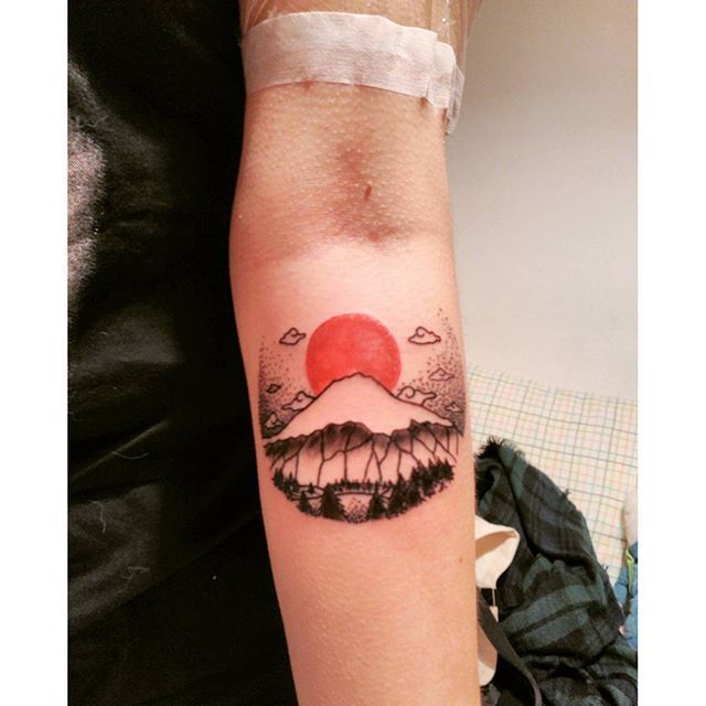 Single needle Mount Fuji tattoo on the inner forearm