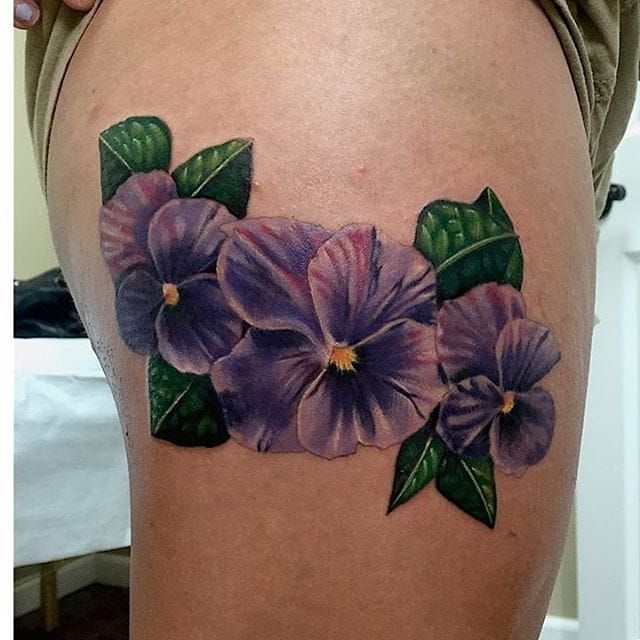 Violet flowers tattooed on the right arm by Rey Jasper  Violet flower  tattoos Birth flower tattoos Violet tattoo