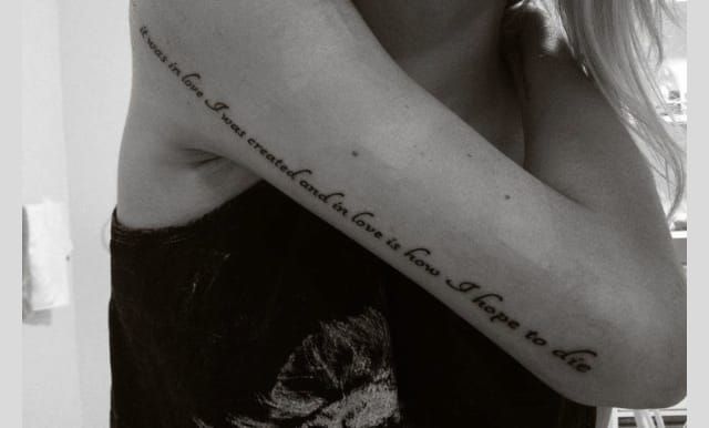 Quirky spot for a quote, the small font sort of makes it work. They're lyrics that allude to a bible verse.