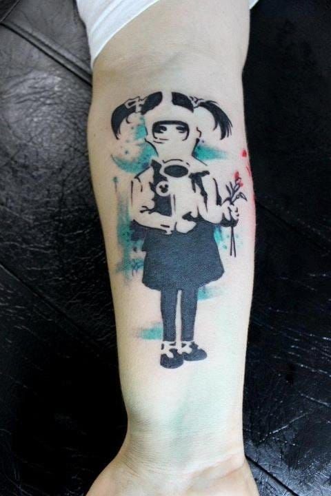 Strong one, but the credits to the tattooist are missing : can you tell us who?