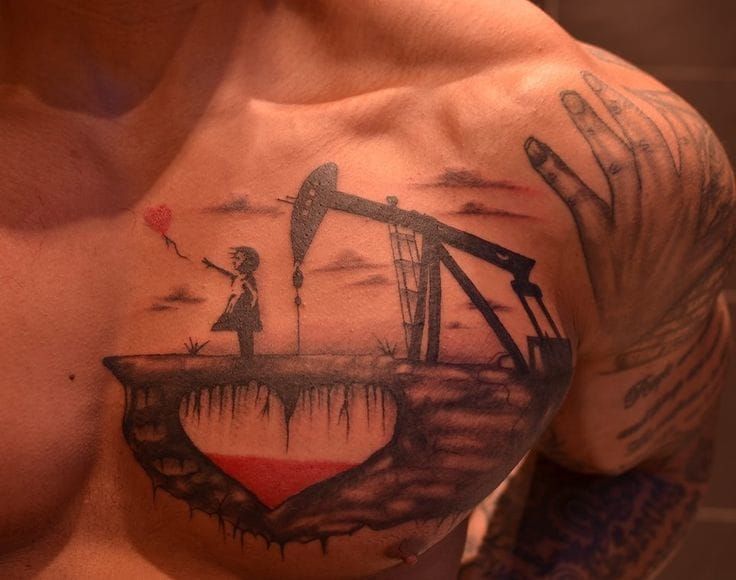 Great chestpiece. Couldn't find the name of the tattoo artist, please tell us in comments.