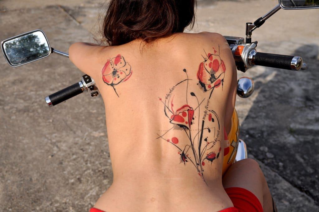Tattoo by Miss Voodoo, photography by Ledorme.