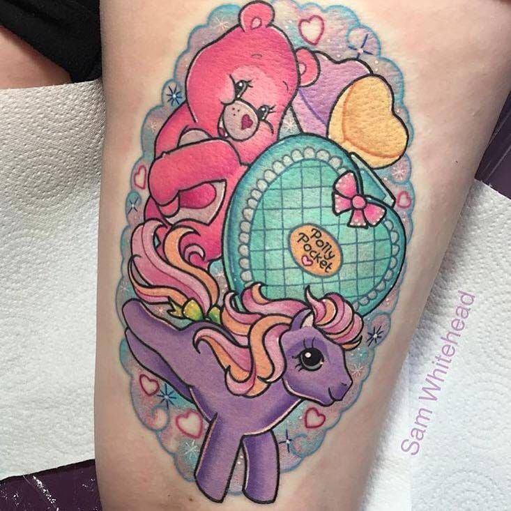 Care bear tattoo on the thigh