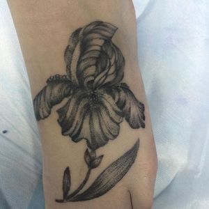Black and grey iris foot tattoo by Sasha Katuna. #blackandgrey #flower #iris #SashaKatuna