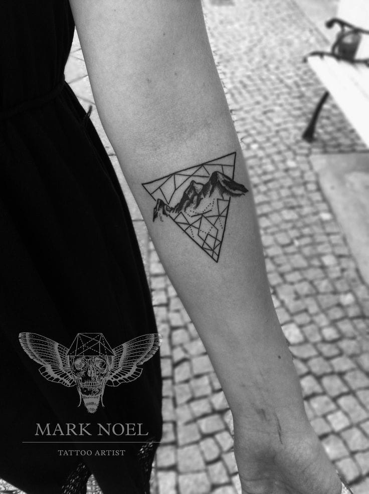 Tasteful geometric mountain tattoo piece by Mark Noel. #mountain landscape #geometric #MarkNoel