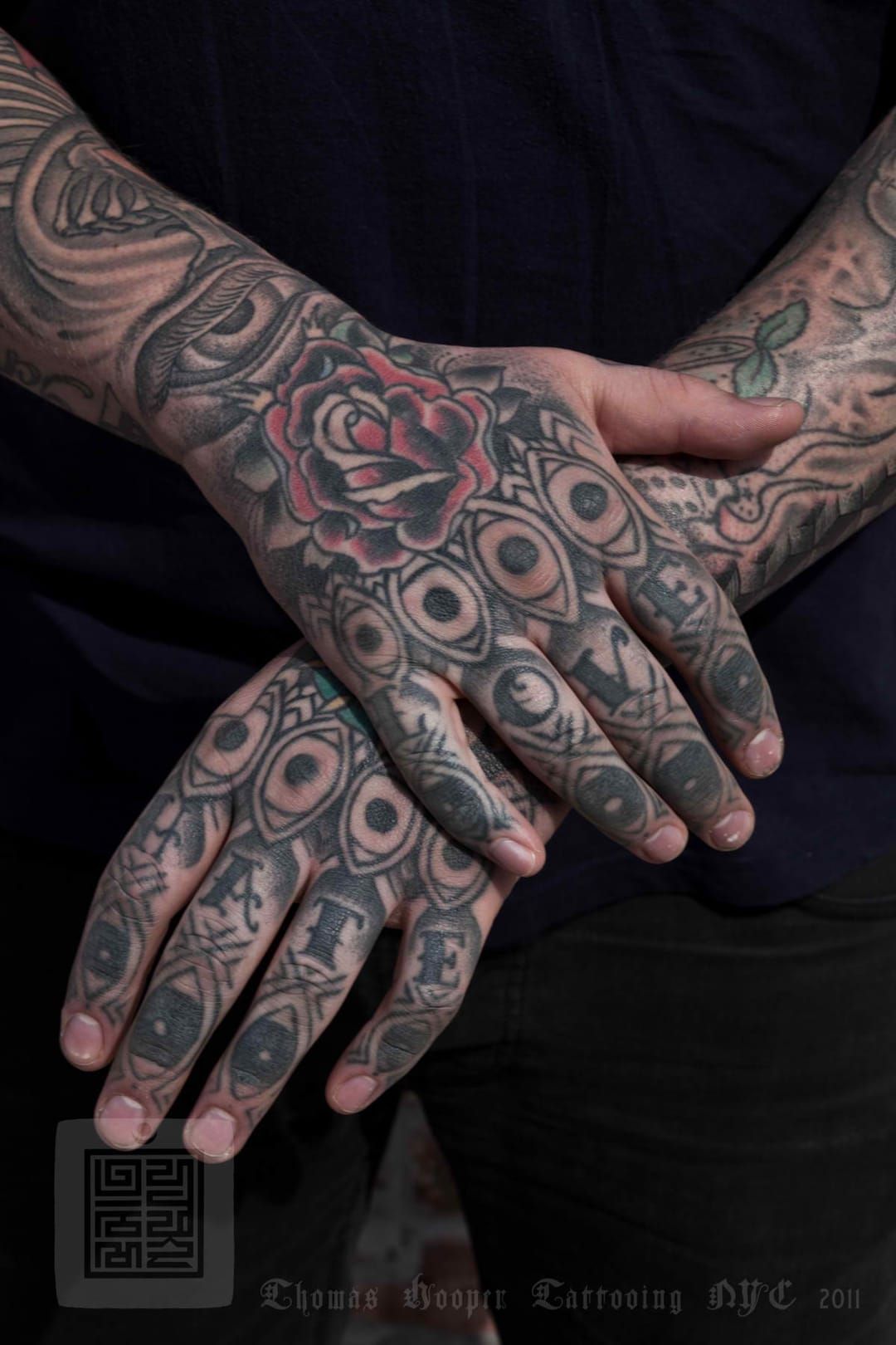 Black rose and finger bangers done by Boomer Raegan, Total Immortal Tattoo  Salon in Lorain Ohio : r/tattoos