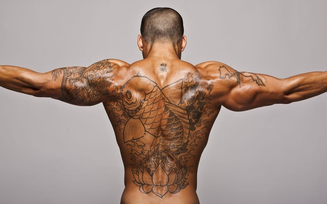 Top 12 Ripped Athletes With Tattoos • Tattoodo