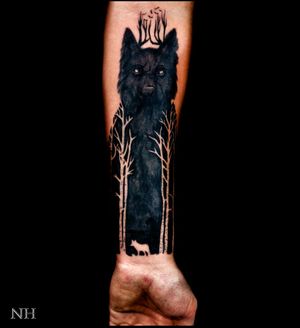 Awesome blackwork of wolf and nature