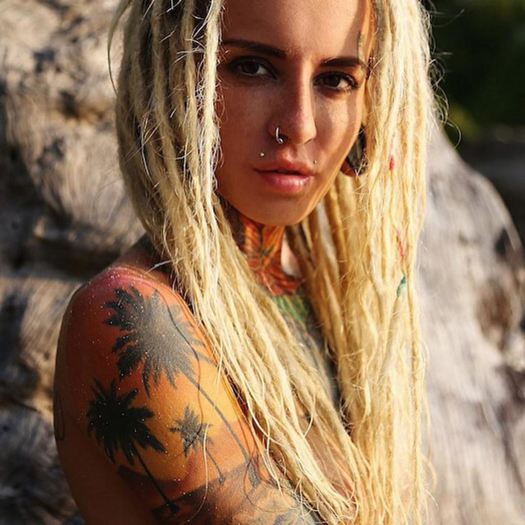 Lovely tattooed model Bantik Boy had a beach sleeve made at Odin Tattoo.