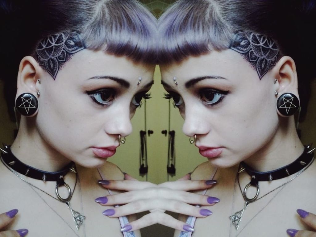 Hair and scalp tattoos can be realy feminine. Tattoo by Swirly Sinatra.