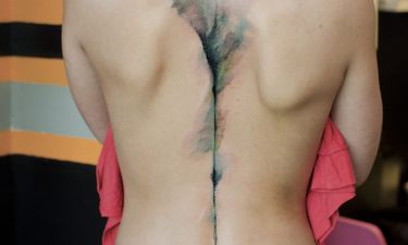 Narrowing Down Blackwork tattoo Line on Back - Best Tattoo Ideas