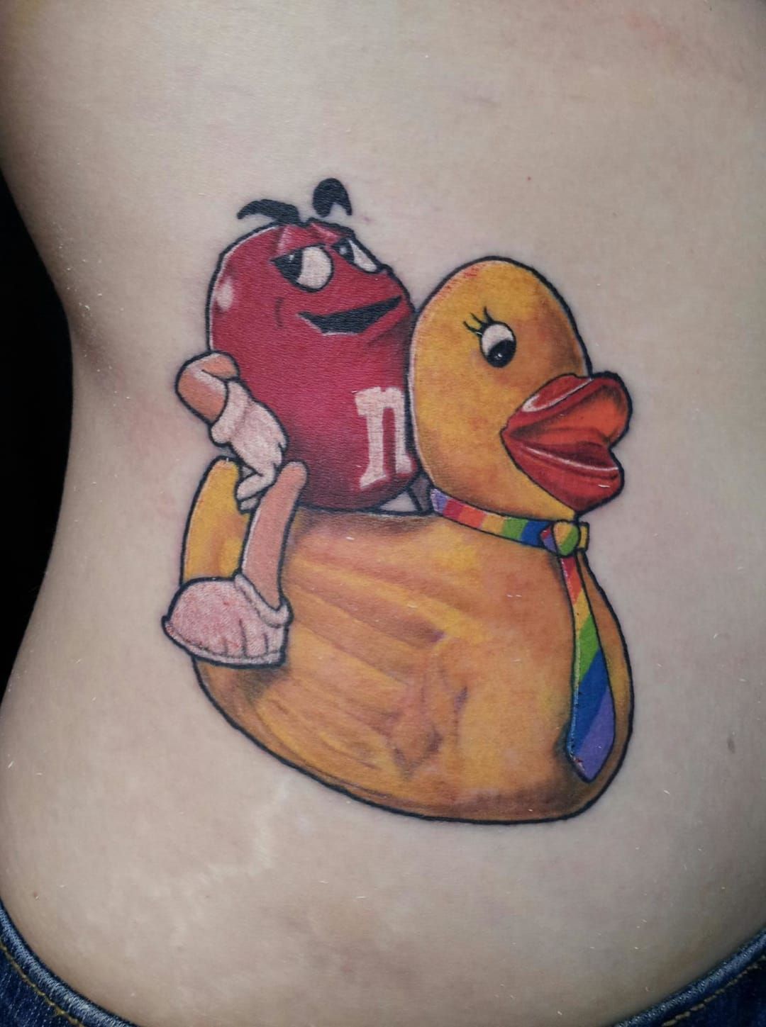 M&M riding a rubber ducky by Ben Reiter