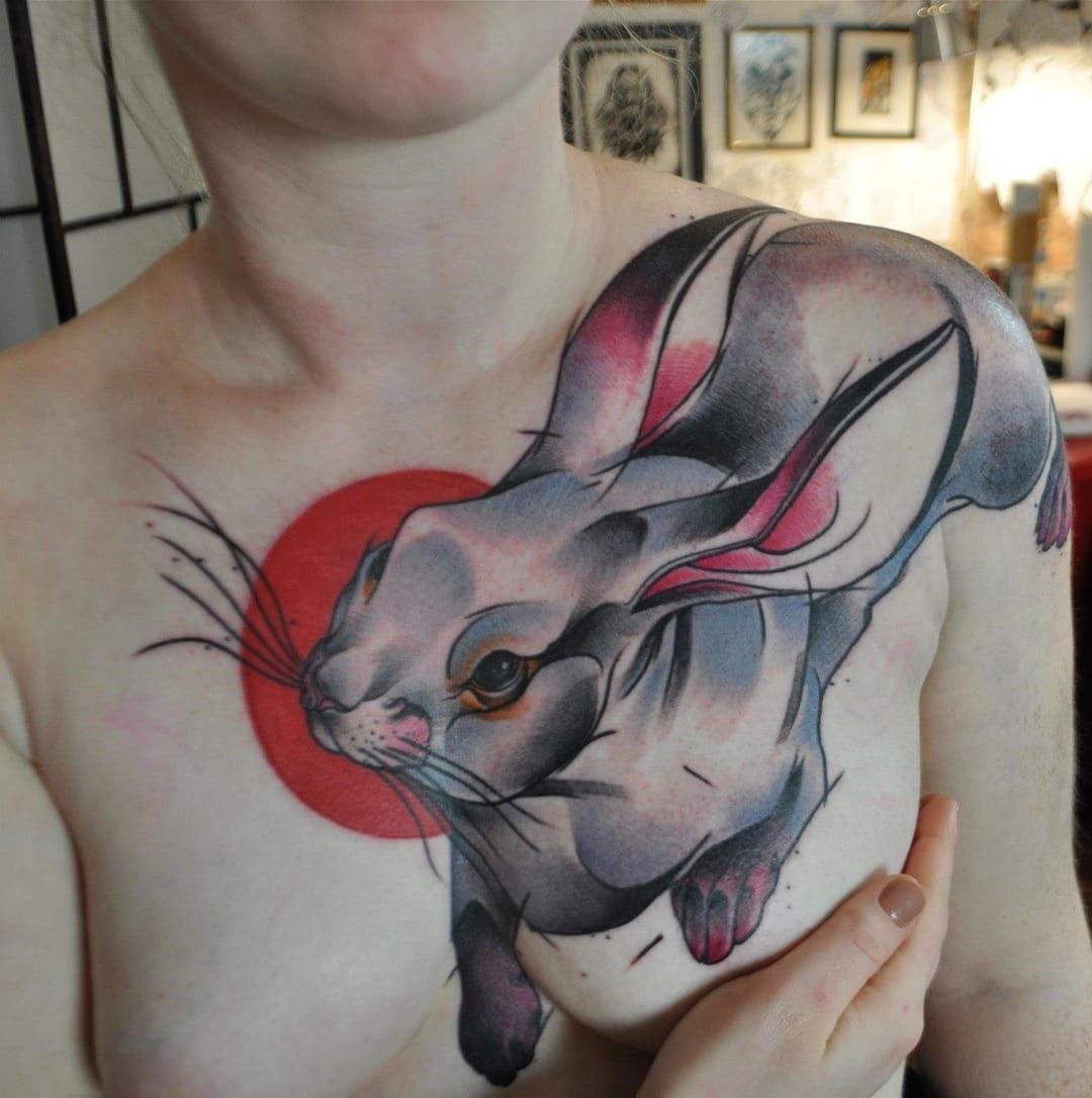 Bunny portrait tattoo located on the bicep,