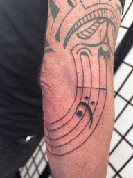 Musical Staff Tattoo