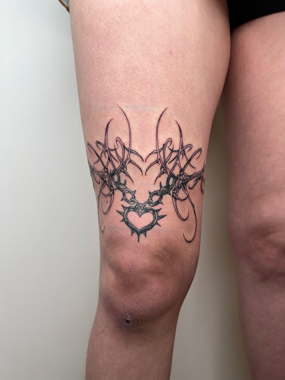 floral rib tattoo