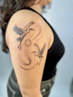 Flying Cranes with Sun and Swirls