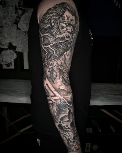 Finished Norse inspired neotraditional sleeve, background and some elements still fresh, rest healed.