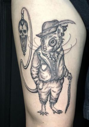 Illustrative black and gray tattoo of a skull with steampunk elements, featuring a mouse or rat. Designed by Amandine Canata.