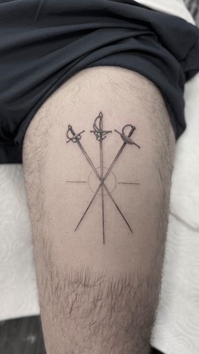 Elegant and intricate fine line design of a sword, incorporating geometric shapes. Perfect for those who seek a unique and artistic tattoo.