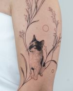Close-Up Realistic Cat Botanical Tattoo